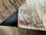 a close up of a piece of clothing with a tag on it