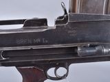 an image of a gun with a magazine on the back of it