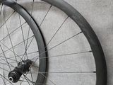 two wheels that are sitting next to each other on the floor