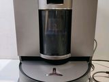 a coffee maker that is sitting on top of a table