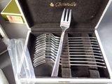 silverware in a case with forks and spoons inside of it