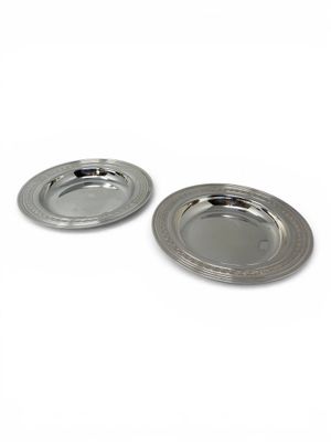 pair of silver plated dishes on a white background