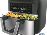 une friteuse à air chaud contenant des légumes, avec une horloge numérique sur le côté