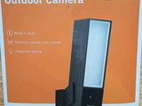 a box with a picture of an outdoor camera on it
