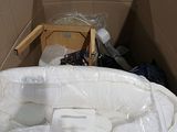 a cardboard box with a baby bed inside of it