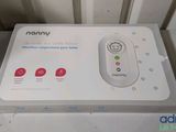 a white box that has a remote control in it