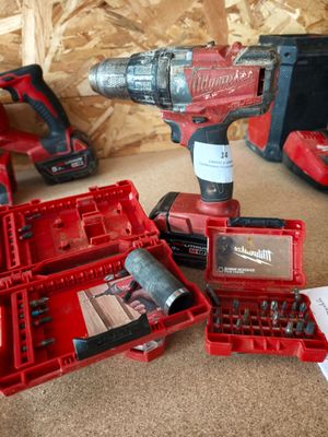 many tools that are sitting on the floor next to each other