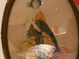 a picture of a woman with a bird in a picture frame