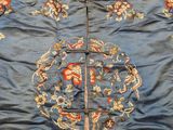 a blue cloth with a floral design on it