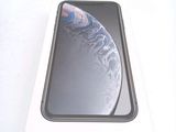 an apple iphone xr in a white box on a white surface
