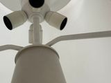 a close up view of a lamp that is on a pole