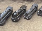 a lot of luggage sitting on the floor next to each other
