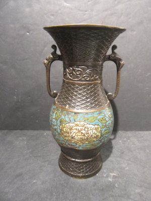 a bronze vase with a blue and gold design on it