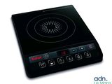 une image représentant une plaque de cuisson électrique noire sur fond blanc