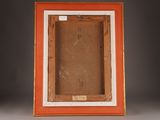 an orange picture frame with a white border and a brown background