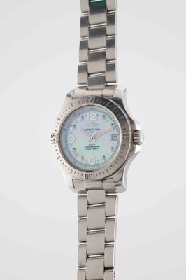 an image of a close up of a watch on a white background