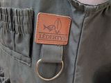 a close up of a person ' s pants with a leather label on it