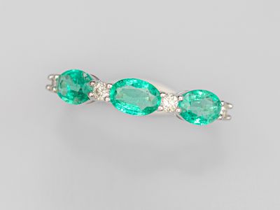 an emerald and diamond ring