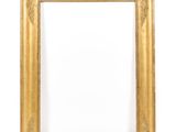 a gold frame with a white background and a red border