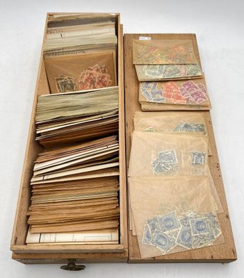 a wooden box with many different types of stamps in it