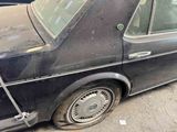 a car that is parked on the side of the street