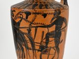a vase that has a picture of a man on a bike on it