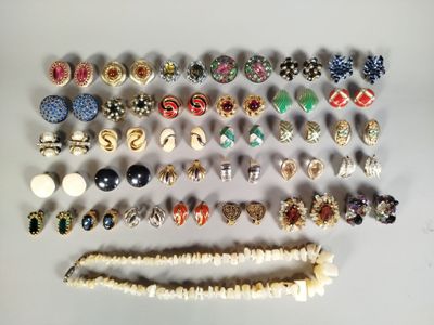 many different types of jewelry on the table