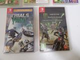 two nintendo wii games are sitting on a table next to each other