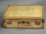 an old suitcase that is sitting on a table