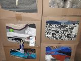 two boxes with different items in them sitting on a pallet