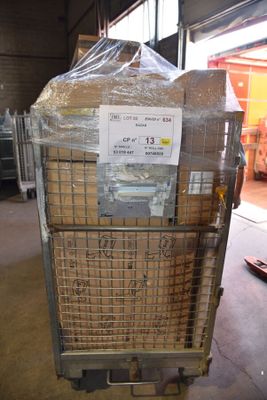 a cart with a bunch of boxes on it in a warehouse