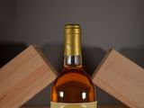a bottle of wine that is sitting on a table