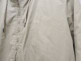 a picture of a jacket with a hood on a hanger