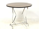 a small table with a wooden top and chrome legs