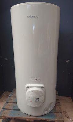 a white water heater sitting on a pallet on a pallet
