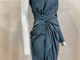 an image of a mannequin dressed in a blue dress