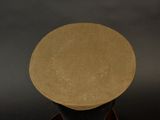 a brown hat on top of a black table