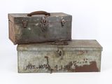 two old suitcases stacked on top of each other