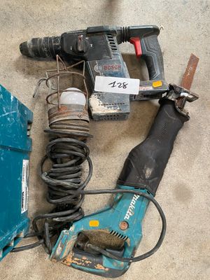 many tools that are laying out on the floor