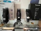 many different types of hair clippers on display in a store
