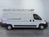 a picture of a white van parked in a room