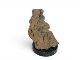 an image of a sculpture of a rock on a black base