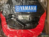 a bag with a yamaha logo on it sitting in a box