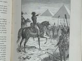 un livre ouvert avec l'image d'un homme sur un cheval