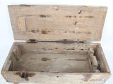 a small wooden box with a handle on it