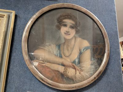 a picture of a woman sitting in a chair in front of a mirror