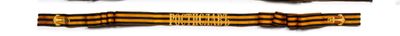 a blurry photo of a yellow and black striped curtain