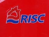 the logo on the back of a red motorcycle with a blue and white logo