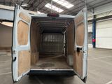 a white van that is parked in a building