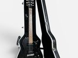 a black guitar and a black case on a white background